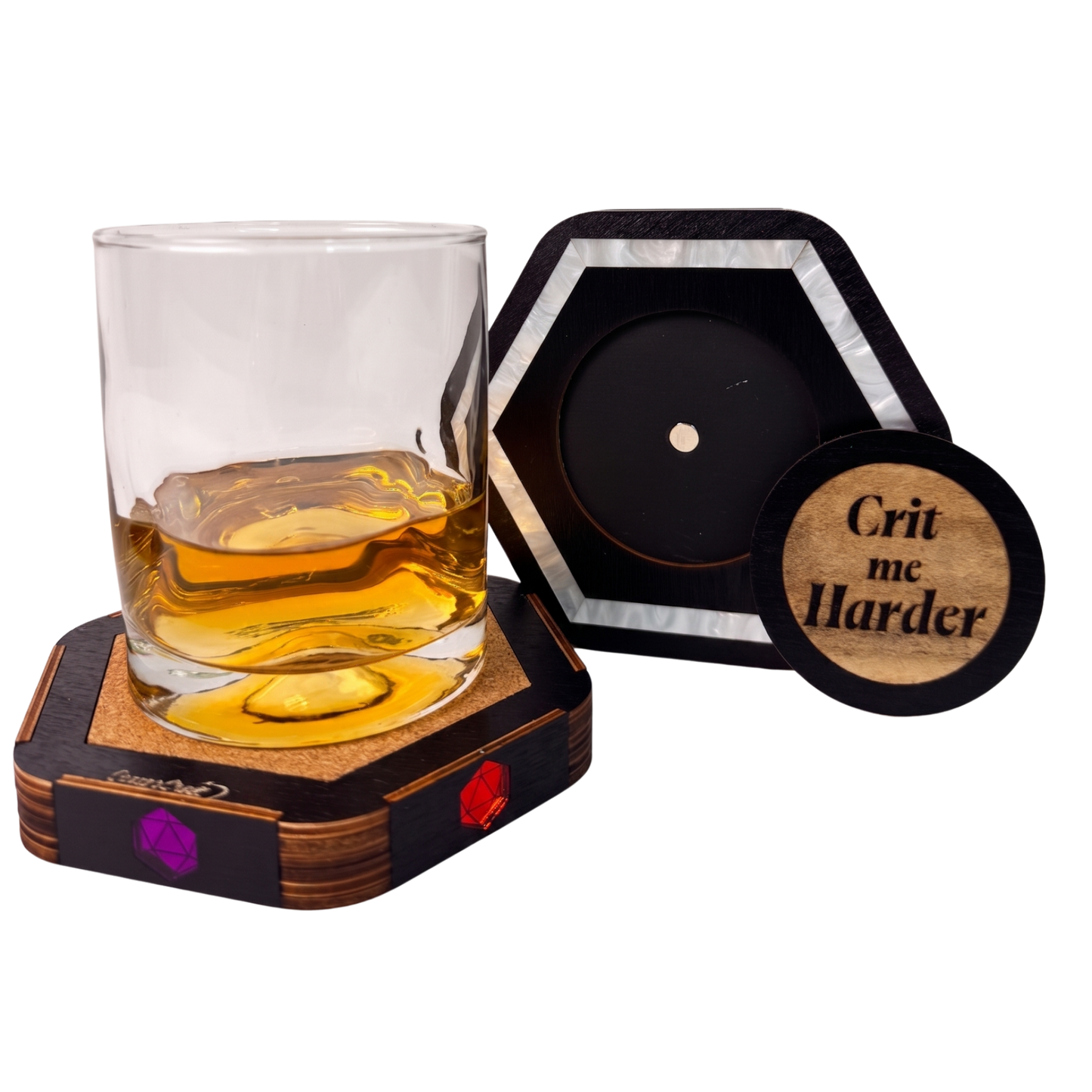 Jeweled Agenda Dice Vault used as a whiskey glass coaster on its cork base, with the swappable magnetic Crit me Harder wood medallion shown detached